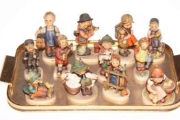 Collection of twelve Hummel figures including Puppy Love, Feeding Time,