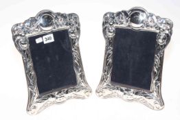 Pair of floral embossed Sterling silver photograph frames, image size 7x5 inches.