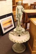 Shell and water carrier figure pedestal bird bath, 134cm.