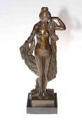 Bronze model of a classical nude maiden figure on marble base, 43cm high.