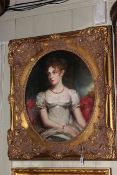 Oval portrait oil on canvas of a lady in heavy gilt frame, 81cm by 71cm.