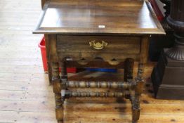 Oak single drawer side table on bobbin legs, 71cm by 69cm by 45cm.