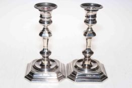 Good pair of silver candlesticks each with knopped stems on square stepped bases, Sheffield 1998,