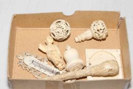 Box of antique ivory including concentric circles, parasol handle, frame, figure, etc.