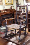 19th Century rustic rush seated child's rocking chair.