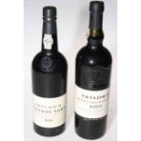 Two bottles of Taylors Port, 2000 and 1985.