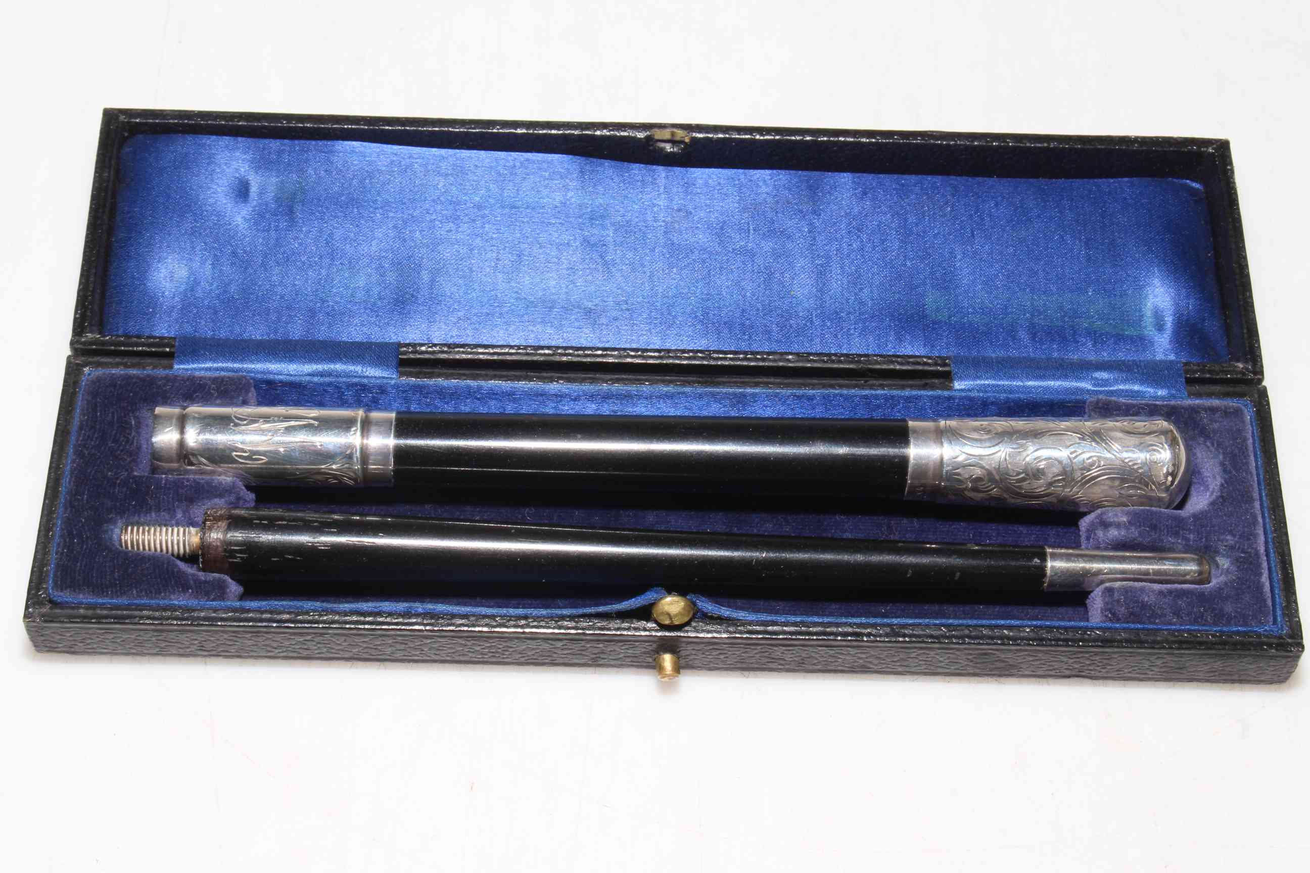 Ebonised and silver mounted baton, London 1929, cased.