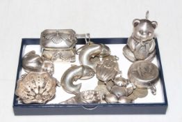 Box with silver mustard pots, some coins, and babies rattles (some silver).