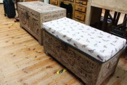 Two similar bleached carved camphorwood trunks (largest 57cm by 105cm by 52cm).