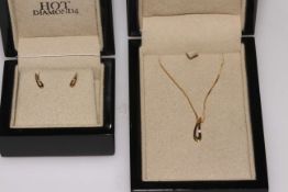 9k gold Hot Diamonds pendant necklace and earrings, both boxed.