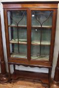 Edwardian mahogany and line inlaid two door vitrine, 165cm by 90.5cm by 34cm.