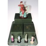 Kevin Francis limited edition Susie Cooper figure, and four small Peggy Davis figures,