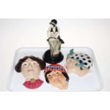 Kevin Francis limited edition Clarice Cliff Centenary figure, and three face masks (4).