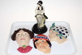 Kevin Francis limited edition Clarice Cliff Centenary figure, and three face masks (4).