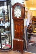Antique mahogany eight day longcase clock having arched dial painted with buildings and hunting