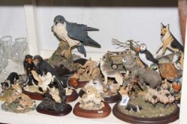Eighteen wildlife ornaments including Country Artists.