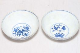 Matched pair of Chinese blue and white fine porcelain bowls, decorated with birds and hens,