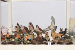 Twenty one animal ornaments including Country Artists and Royal Doulton.