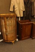 Walnut bow front china cabinet and Victorian panel door cupboard.