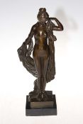 Bronze model of a classical nude maiden figure on marble base, 43cm high.