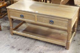 Horace 'Knight Man' Knight two drawer oak adzed cut low table with undershelf, 53cm by 107.