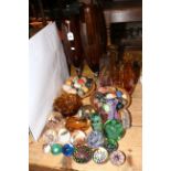 Collection of onyx eggs, glass paperweights, amber glass, Murano, etc.