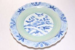 Japanese charger in blue and white with celadon green band, 41cm diameter.