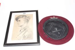WWII red beret, Kangol Wear 1944, together with framed portrait of a soldier.