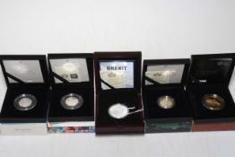 Four silver proof coins in boxes with COAs inc Celebrating the Life & Work of H. G.