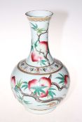 Large Chinese bottle vase with peach tree decoration, overglaze iron red six character mark, 39cm.