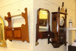 Victorian style wall clock, wall mirror with brush box and two door wall cabinet (3).