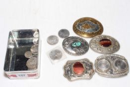 Collection of coins and belt buckles including 1889 Victorian crown, Morgan Dollar, Peace Dove £2,
