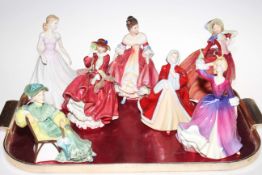 Seven Royal Doulton figures including Southern Belle and Ascot.