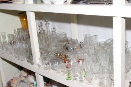 Collection of glasswares and a box of books.