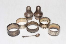 Four silver napkin rings, salt spoon, condiments and EP napkin ring.