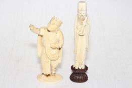 Two antique ivory figures, largest 19.5cm.