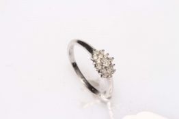 9 carat white gold diamond cluster ring, size L.