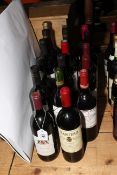 Seventeen bottles of red wine including Merlot, Santero 1998, Claret, St. Emilion 1990, etc.