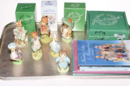 Seven Beswick and Royal Albert Beatrix Potter figures, some boxes and booklets.