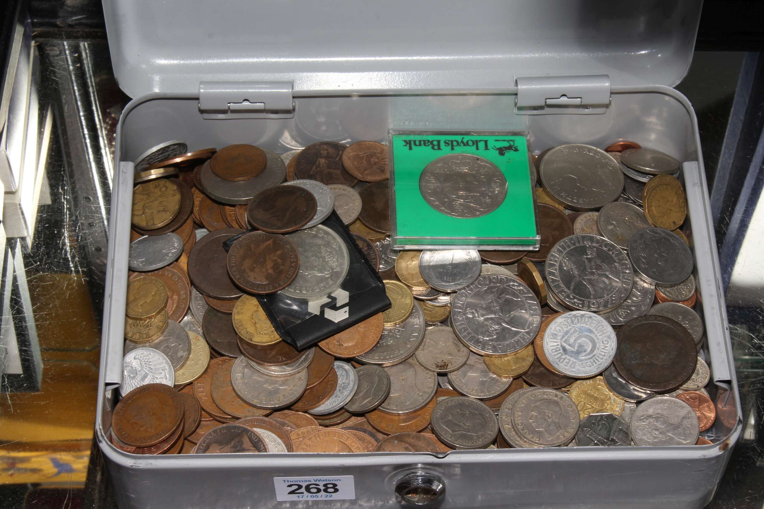 Box of coins and tokens.
