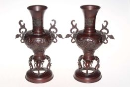 Pair Oriental bronze two handle vases, 32cm.