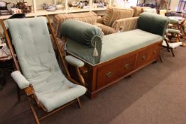 Late Victorian two drawer day bed, three campaign chairs and footstool (5).