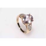 9k Kunzite and diamond ring, size N.