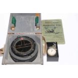 WWII Mosquito compass, Air Ministry stopwatch, and Mosquito pilots manual.