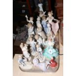 Lladro Angel and lamp, Nao and Leonardo figures and two Coalport figures.