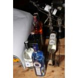 Seven bottles of spirits including Johnnie Walker 1Lt whisky, Bell's 1Lt, Haig Club 1Lt whisky,