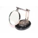 Desk top magnifying glass.