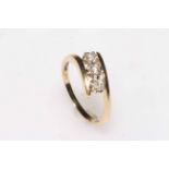 9k three stone diamond ring, size P.