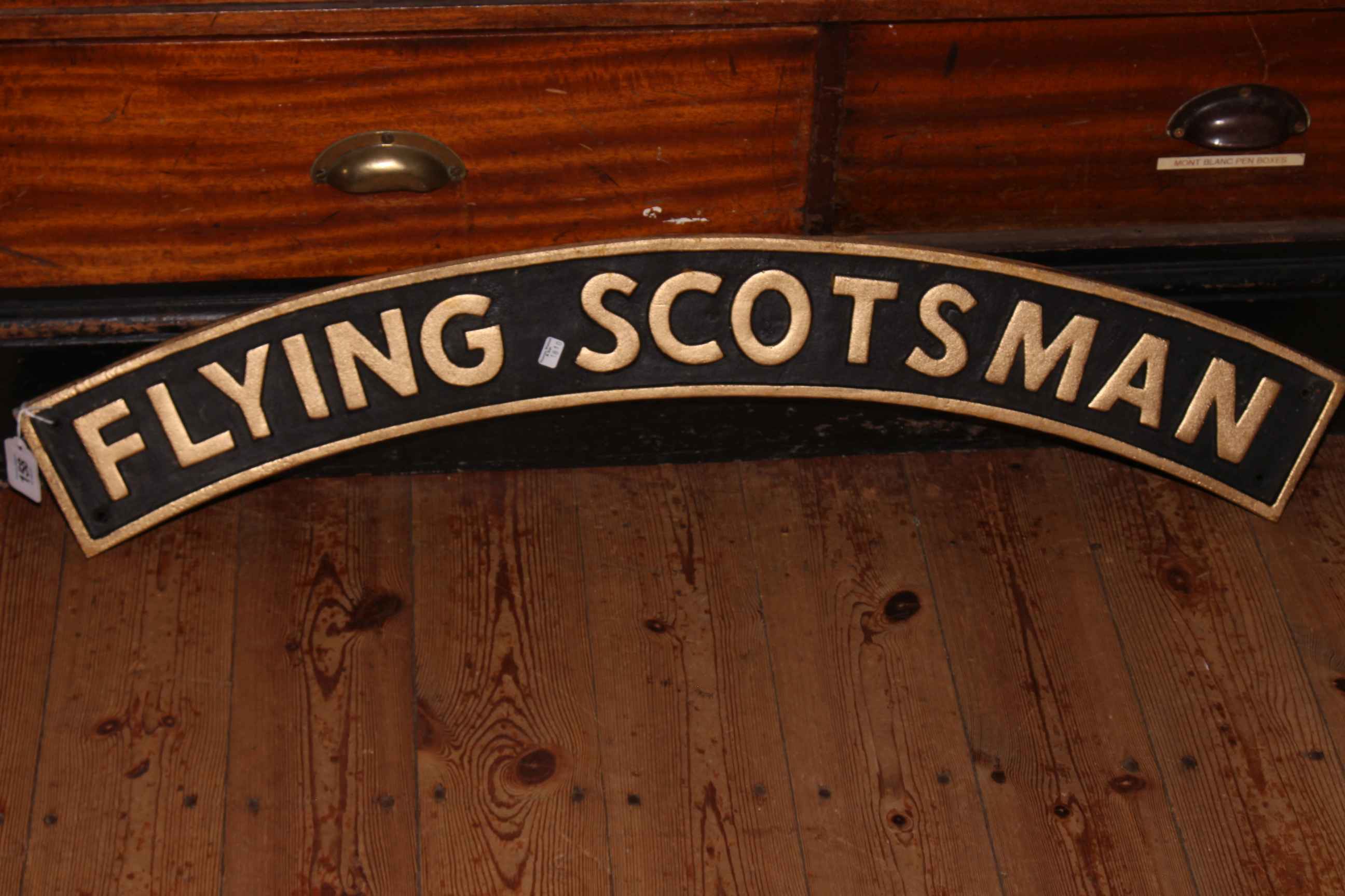 Cast metal Flying Scotsman sign.