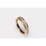 Diamond set 9 carat gold half eternity ring, size K.